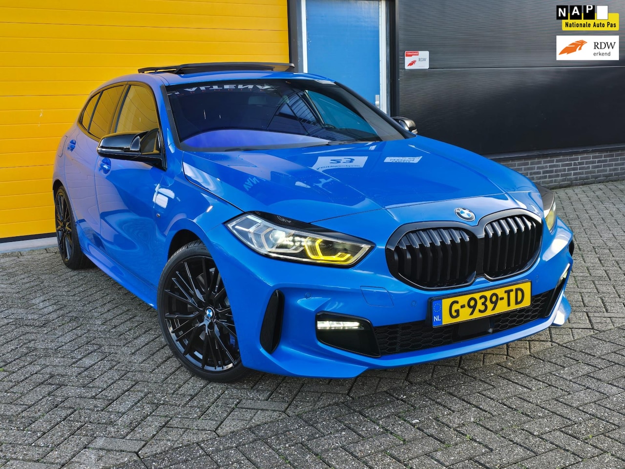 BMW 1-serie - 118i M Line / AUT / NAP / Navi / Camera / M Interieur / Cruise Control / Open Panoramadak - AutoWereld.nl