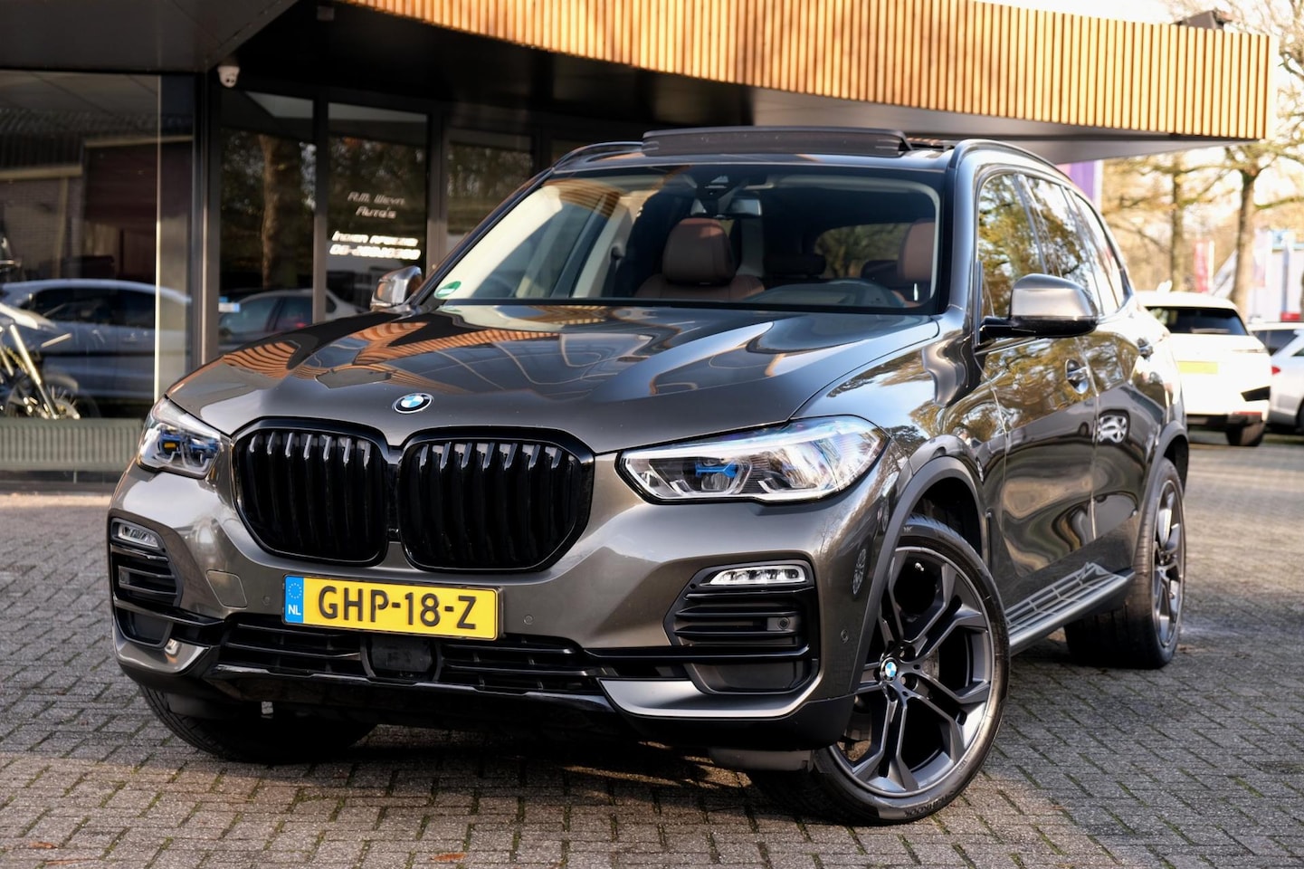 BMW X5 - XDrive30d High Executive/ACC/Pano/HUD/HarmanKardon/Winterpakket/Trekhaak/MANHATTAN GREEN - AutoWereld.nl