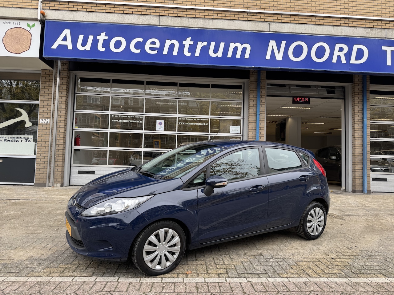 Ford Fiesta - 1.25 Limited 99955KM! NAP | Nieuwe Distributieriem  | Airco | 5-deurs | Dealeronderhouden - AutoWereld.nl