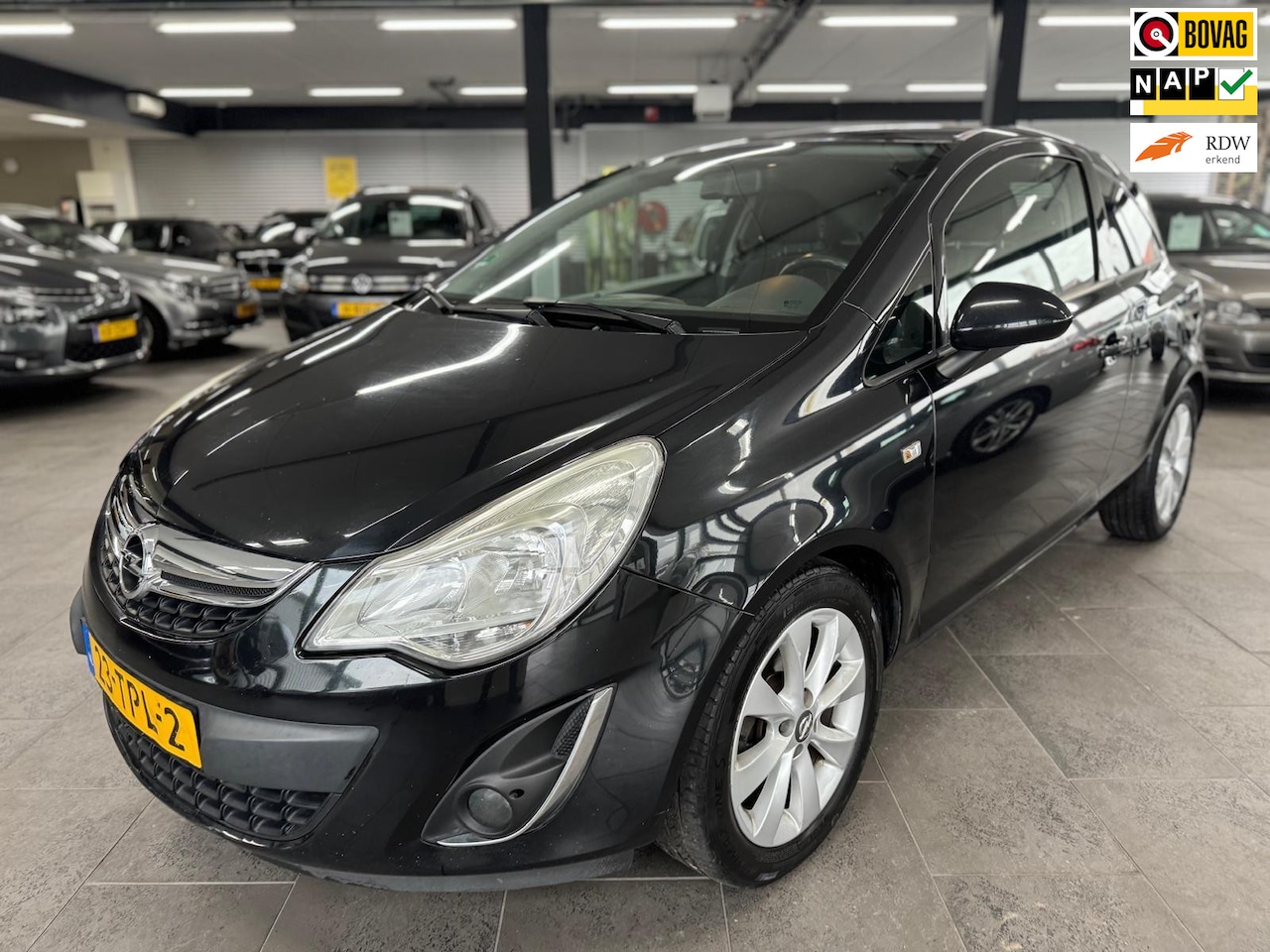 Opel Corsa - 1.4-16V Anniversary Edition navigatie half leer airco cruise controle lm-velgen lux uitvoe - AutoWereld.nl