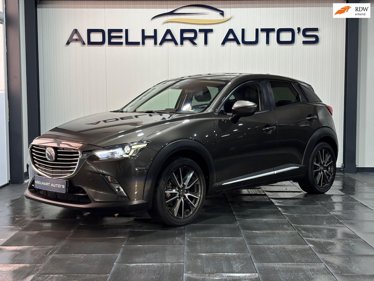 Mazda CX-3 - 2.0 SkyActiv-G 120 GT-M / Navigatie full map / HUD / Cruise control / Climate control / Ca - AutoWereld.nl