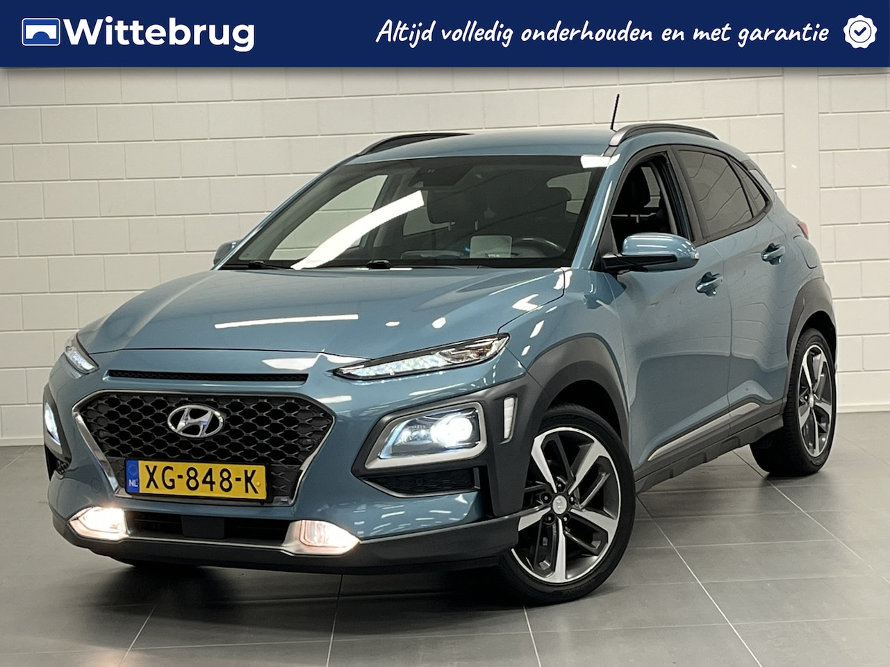Hyundai Kona - 1.0T Premium LEDER | 17 INCH VELGEN | NAVIGATIE | ZEER COMPLEET - AutoWereld.nl