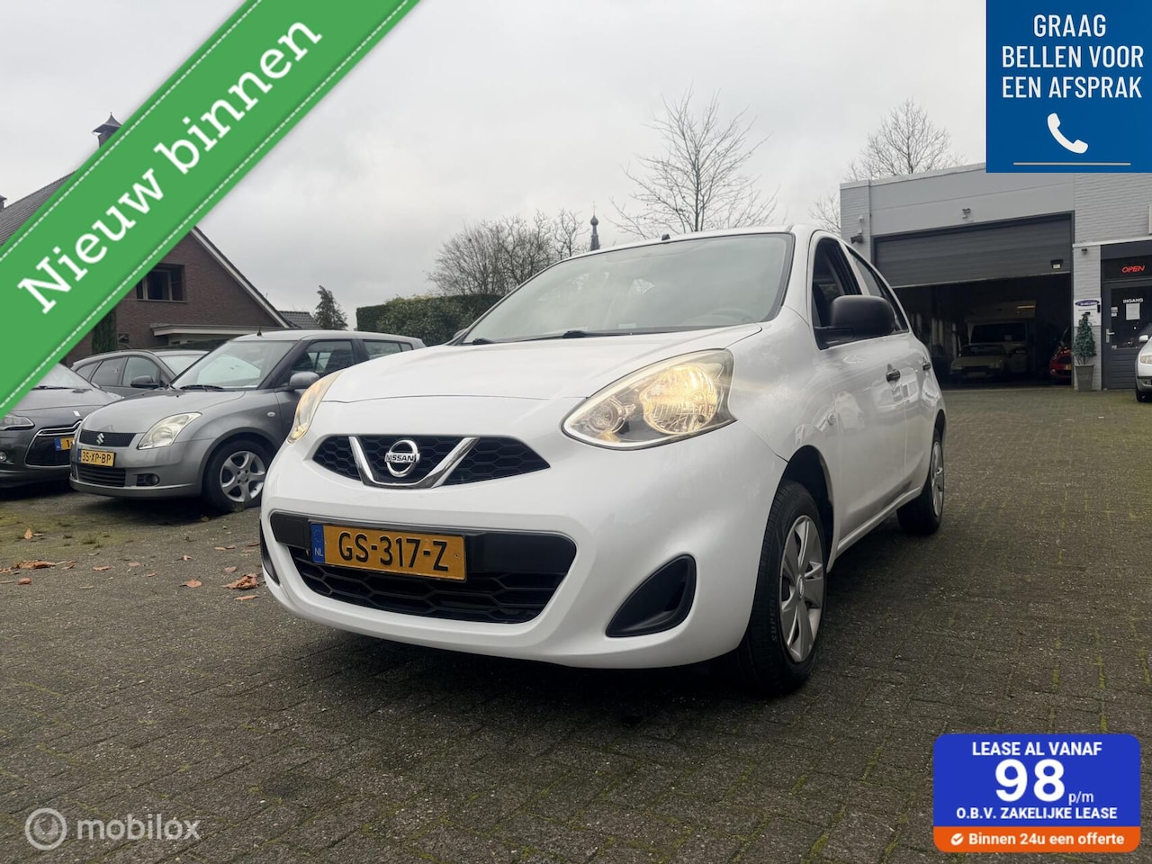 Nissan Micra - 1.2 5 deurs Visia Pack Airco / BlueTooth / Elec ramen / NAP - AutoWereld.nl