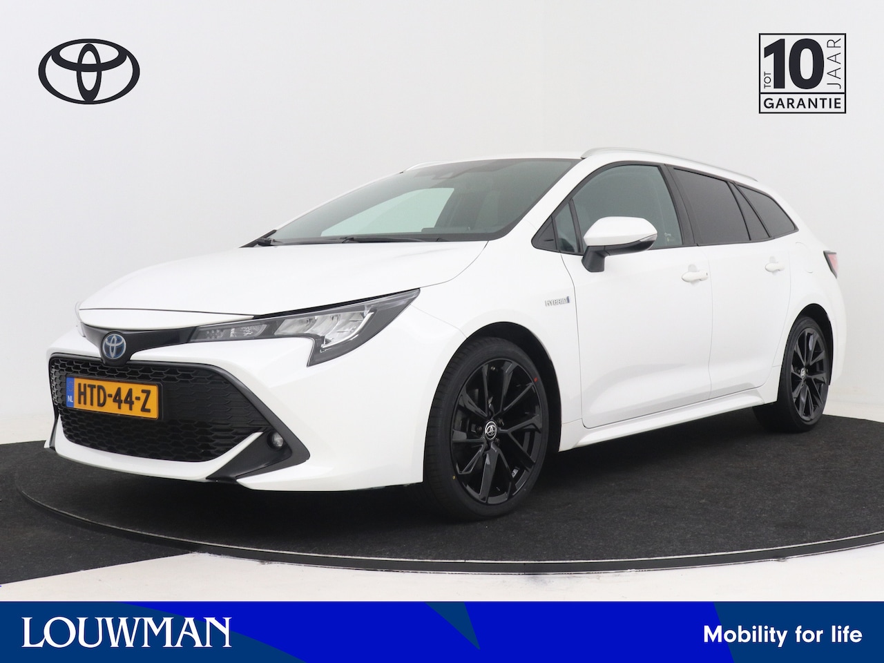 Toyota Corolla Touring Sports - 1.8 Hybrid Active Luxury | Stoel -/ Stuur Verwarming | Apple Carplay & Android Auto | Park - AutoWereld.nl