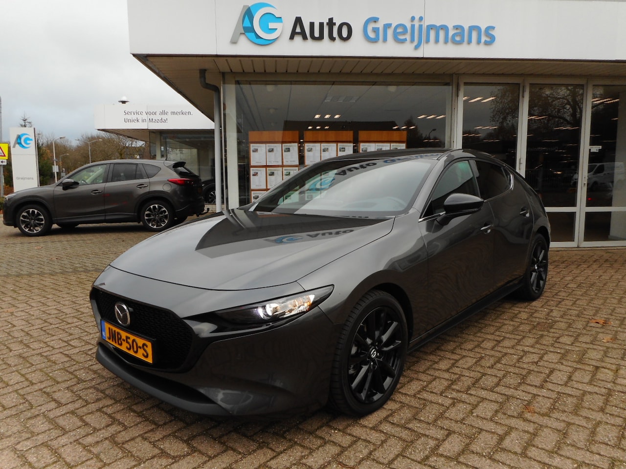 Mazda 3 - 2.0 e-SkyActiv-G M Hybrid 150 Nagisa - AutoWereld.nl