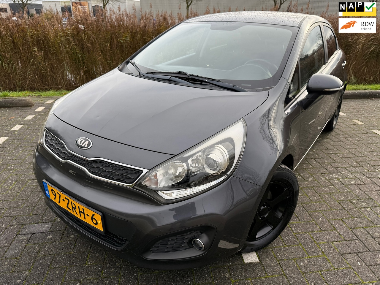 Kia Rio - 1.2 CVVT Design Edition*CRUISE*AIRCO*NAP*PARK SENSOREN*ELKT-RAAM - AutoWereld.nl