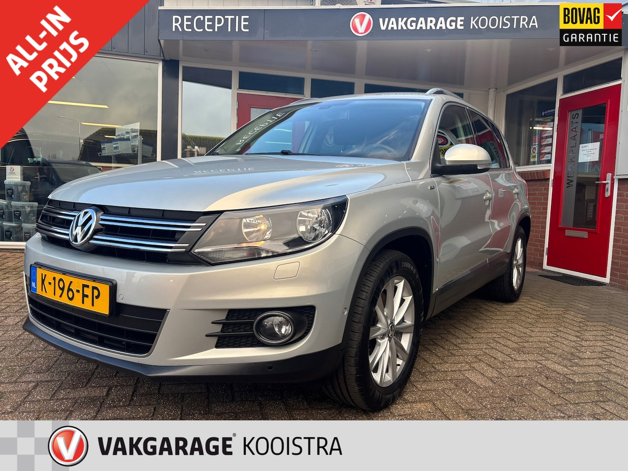 Volkswagen Tiguan - 1.4 TSI Sport&Style Airco/ Trekhaak/ parkeersensoren/ Navi - AutoWereld.nl