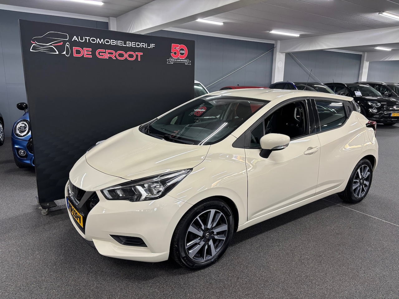 Nissan Micra - 1.0L Acenta NL-auto met Achteruitrijcamera/ DAB-radio/ LM-velgen/ Airco en cruise control - AutoWereld.nl
