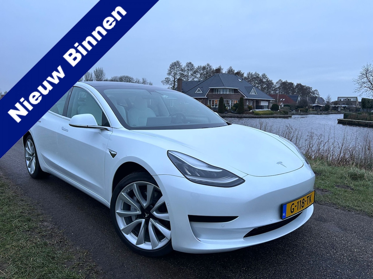 Tesla Model 3 - Standard RWD Plus 60 kWh Autopilot / Panoramadak / Leer / Metallic lak - AutoWereld.nl