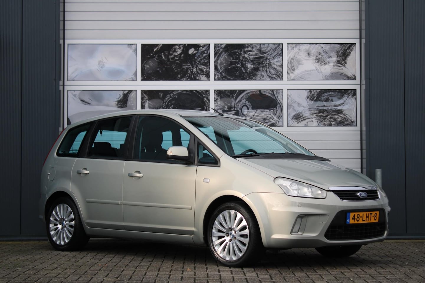 Ford C-Max - 1.8-16V Limited 125pk Clima/Cruise/Navi/Bluetooth/RadioCD.AUX/17"LM/Trekhaak/GoedOnderhoud - AutoWereld.nl