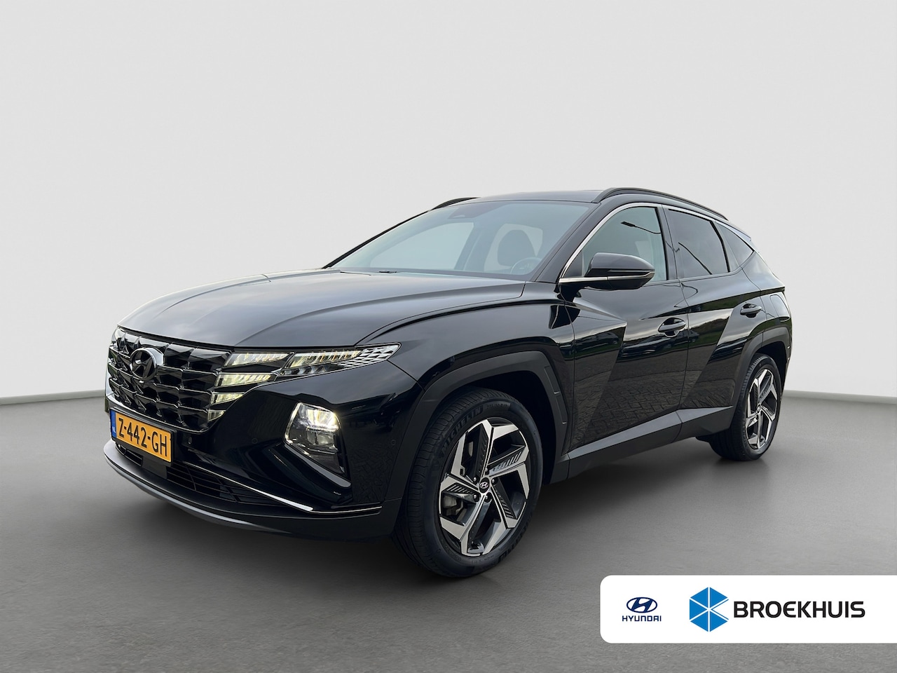 Hyundai Tucson - 1.6 T-GDI 265pk PHEV Premium 4WD (299,- p/m Demo Deal!) | Leder | Carplay | Climate | Keyl - AutoWereld.nl