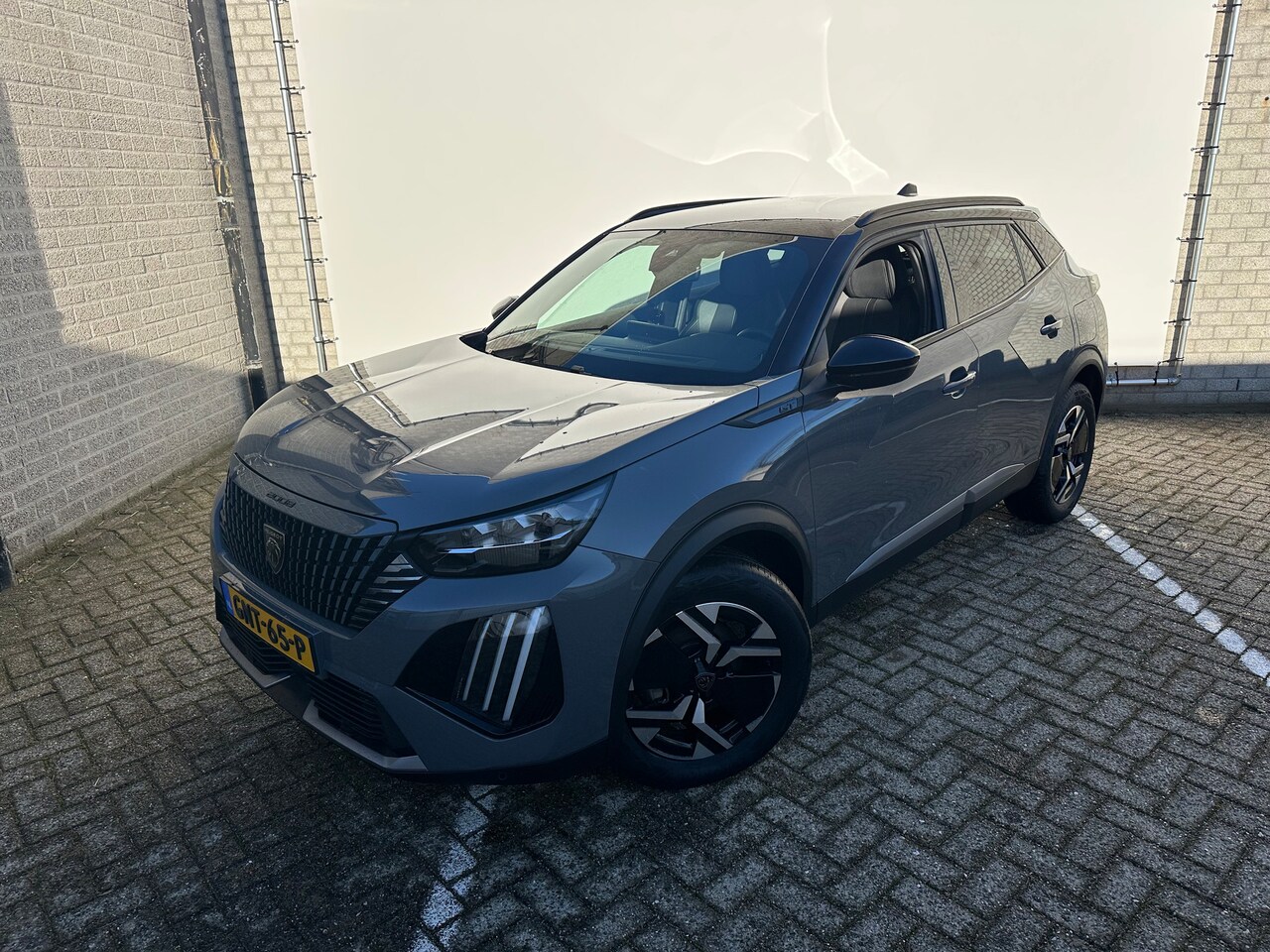 Peugeot 2008 - 1.2 Hybrid 136 GT | Achterbank in delen neerklapbaar | Achteruitrijcamera | Airco (automat - AutoWereld.nl