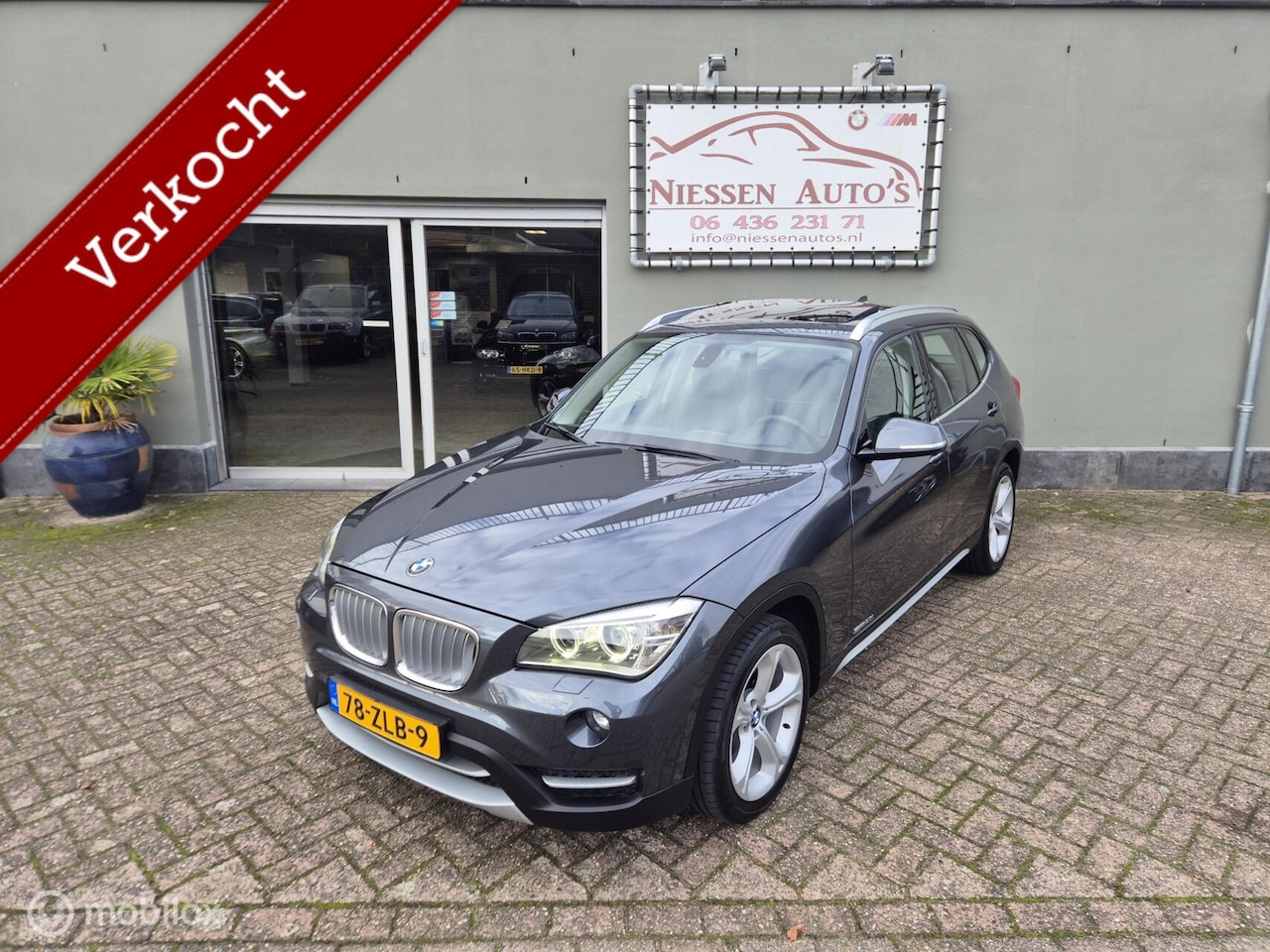 BMW X1 - E84 sDrive20i Pano/Leder/Trekhaak/Navi/Nwe Ketting - AutoWereld.nl