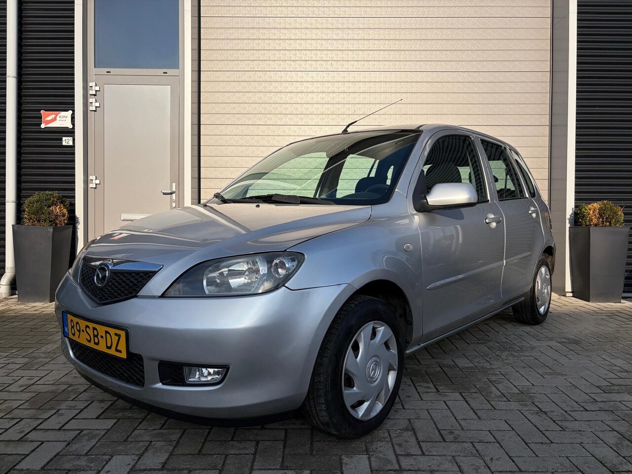 Mazda 2 - 1.4 Touring/106.000 NAP/APK/Airco/NWE distributie/ - AutoWereld.nl