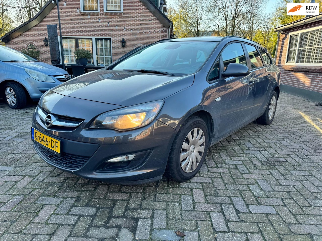 Opel Astra Sports Tourer - 1.4 Anniversary Edition NIEUWE APK 20-11-25 (zo ingeruild zo weg) - AutoWereld.nl