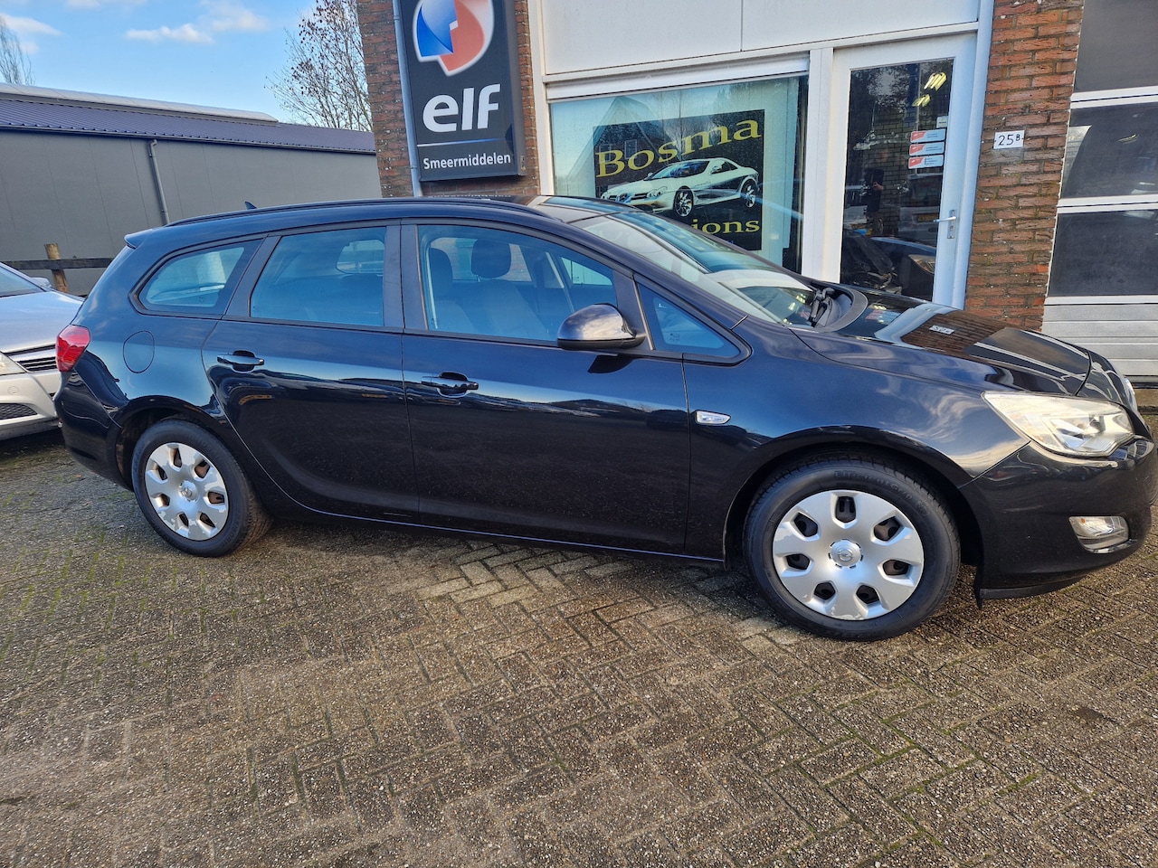 Opel Astra Sports Tourer - 1.3 CDTi "Business Edition" Airco - Cruise - Trekhaak - Apk 01-03-2026 !! - AutoWereld.nl
