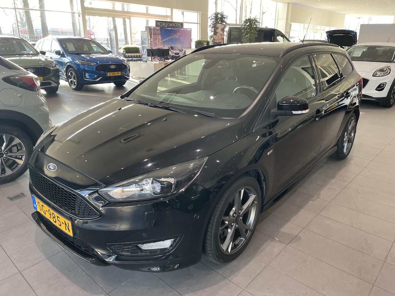 Ford Focus Wagon - 1.5 ST-Line Xenon / Sync3 Navi / ECC - AutoWereld.nl