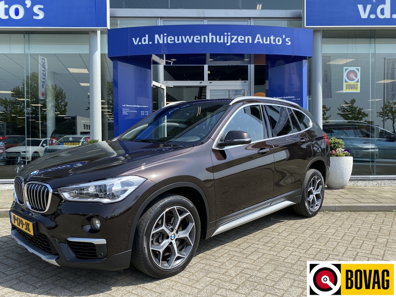 BMW X1 - sDrive20i High Executive | Elektrische stoel | Camera Info Bas: 0492-588982 - AutoWereld.nl