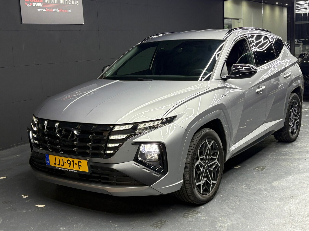 Hyundai Tucson - 1.6 T-GDI PHEV Premium 4WD 1.6 T-GDI PHEV Premium 4WD - AutoWereld.nl