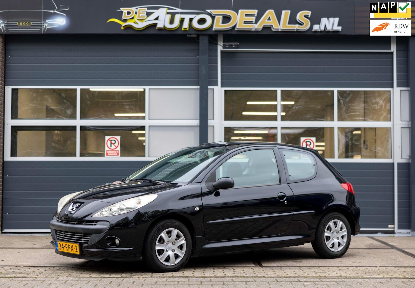 Peugeot 206 - 1.4 XS EERSTE EIGENAAR LAGE KM STAND AIRCO - AutoWereld.nl