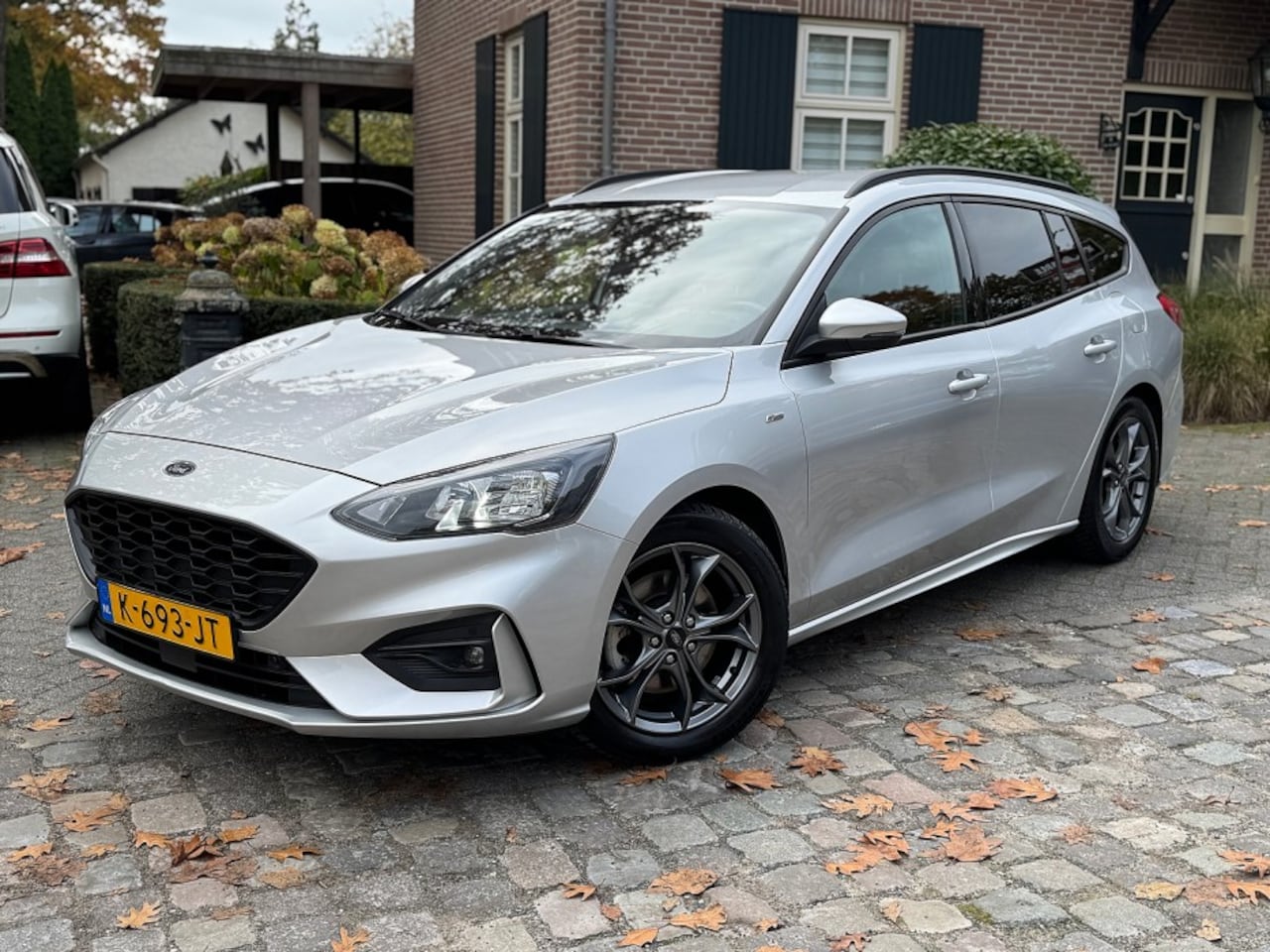 Ford Focus Wagon - 1.0 125pk Hybrid ST Line Bns ecc,navigatie,lmv,carplay,led,dglas,pdc - AutoWereld.nl