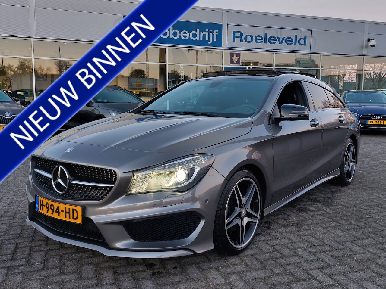 Mercedes-Benz CLA-klasse Shooting Brake - 180 122pk Sport Edition AMG | Airco | Cruise | Bi-Xenon | Leder+Alcantara | Panorama Schui - AutoWereld.nl