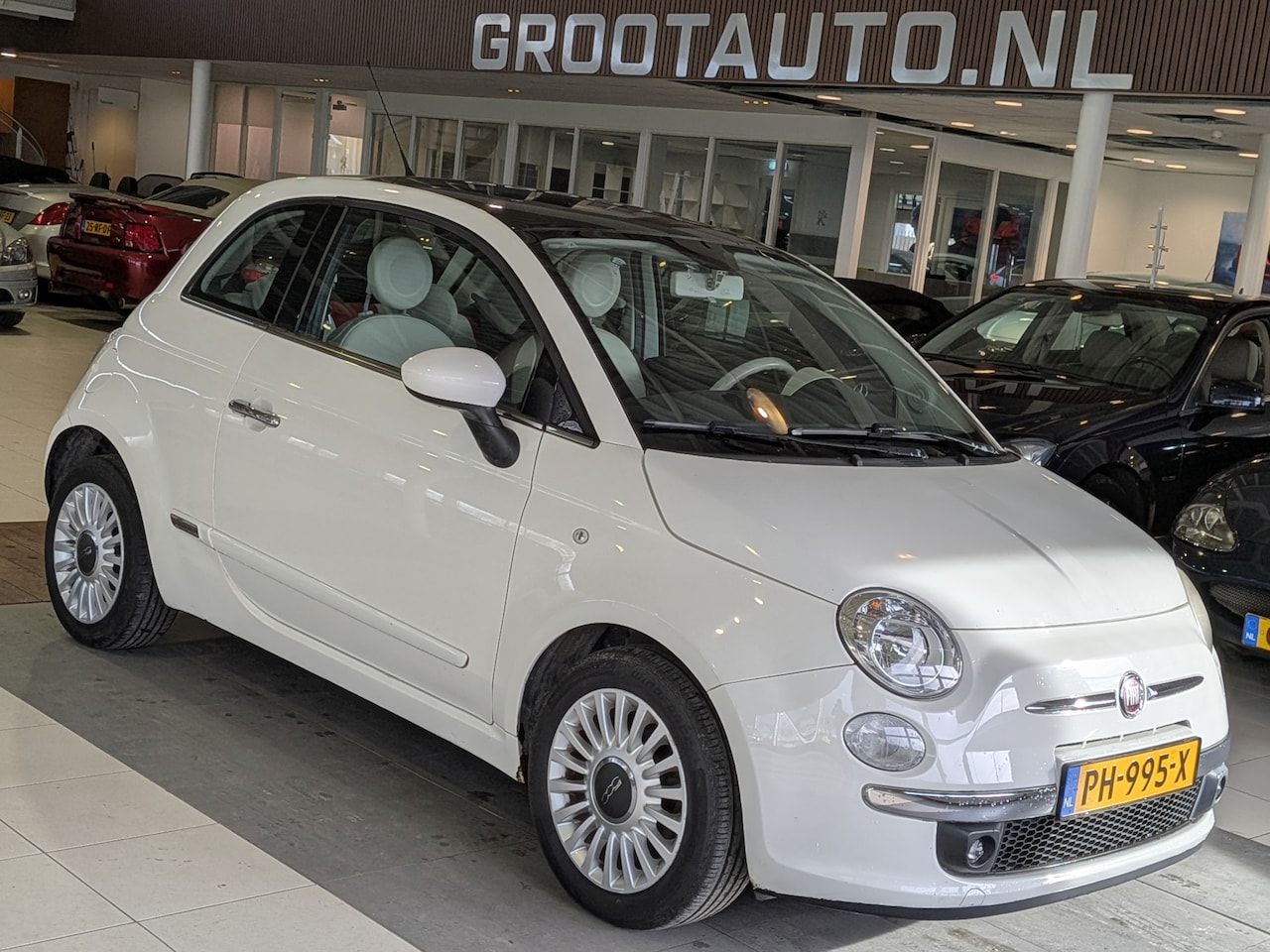 Fiat 500 - 1.2 Lounge Panoramadak, Airco, Stuurbekrachtiging - AutoWereld.nl