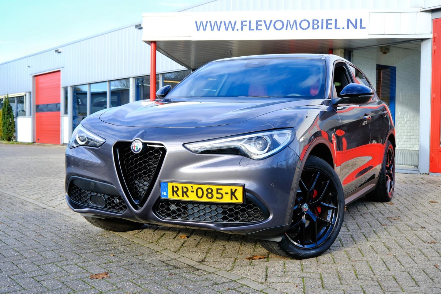 Alfa Romeo Stelvio - 2.0 T 201pk AWD Super Aut. Pano|Xenon|Leder|Navi|LMV - AutoWereld.nl