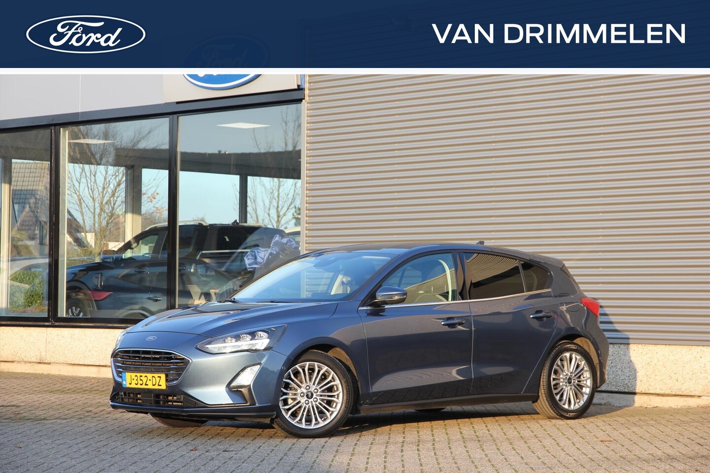 Ford Focus - FORD Focus 1.0 EcoBoost 125pk Titanium Business "Chrome Blue Metallic" | Dealer onderhoude - AutoWereld.nl