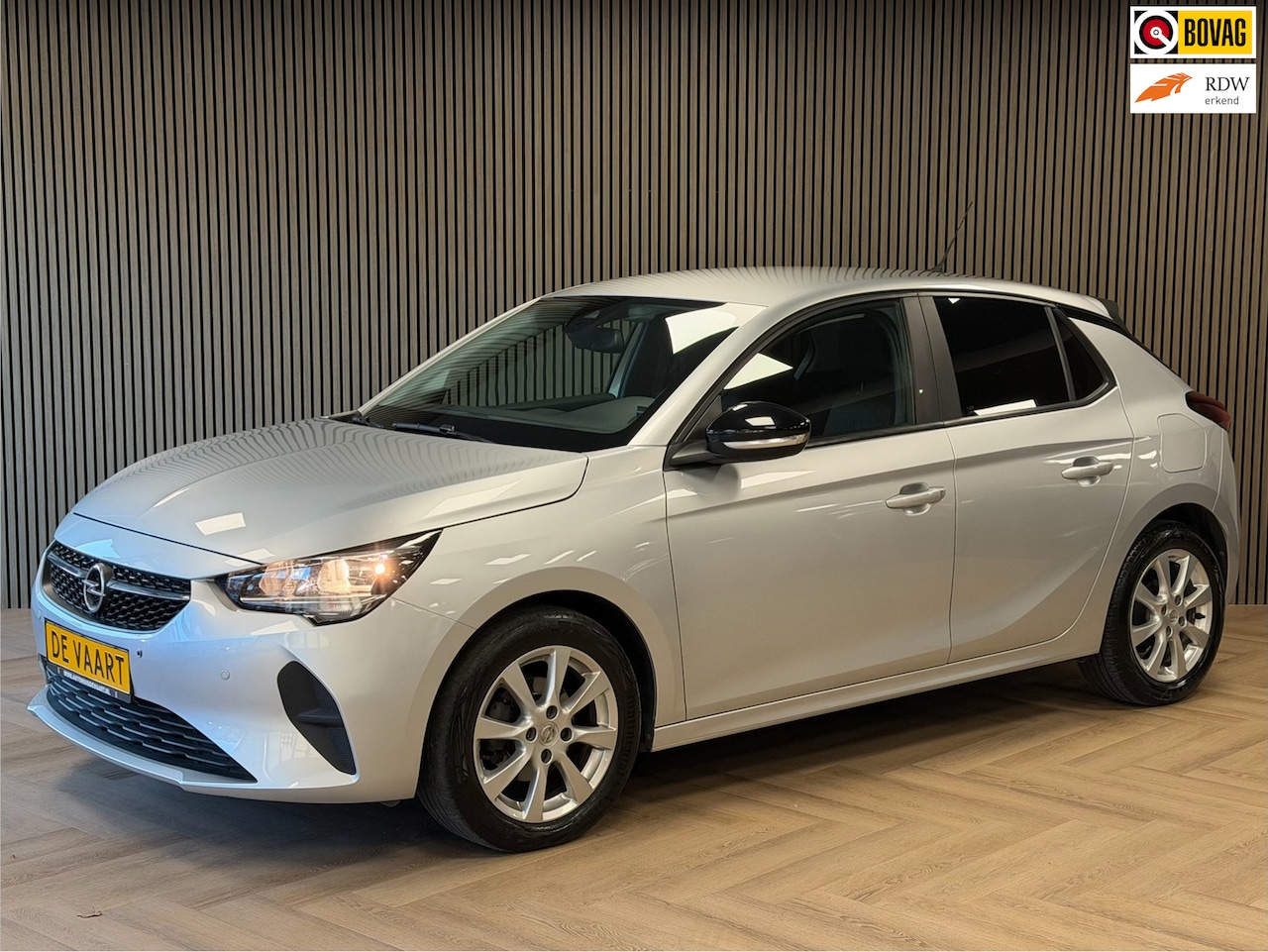 Opel Corsa - 1.2 edition CRUISE CLIMATE CONTROL PDC V+A - AutoWereld.nl