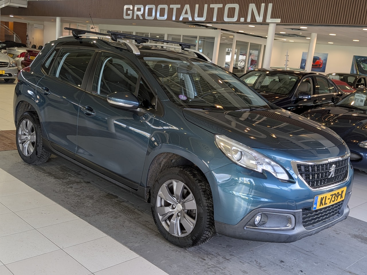 Peugeot 2008 - 1.2 PureTech Blue Lion 89.687km NAP, Panoramadak, Navi - AutoWereld.nl