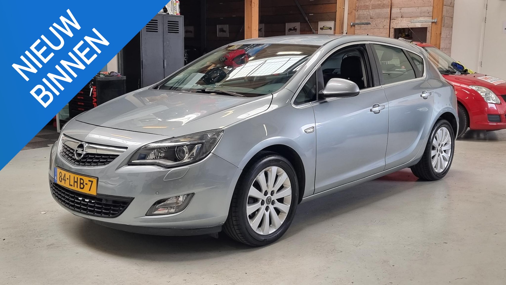 Opel Astra - 1.6 Turbo Cosmo Leer, Navi, Bluetooth, LMV, NAP... - AutoWereld.nl