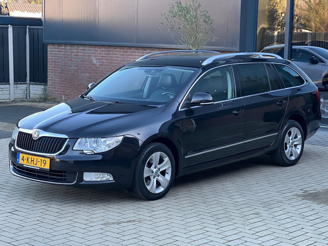Skoda Superb Combi - 1.4 TSI 125 PK NIEUWSTAAT LEER NAVI CRUISE XENON CLIMA MEMORY - AutoWereld.nl