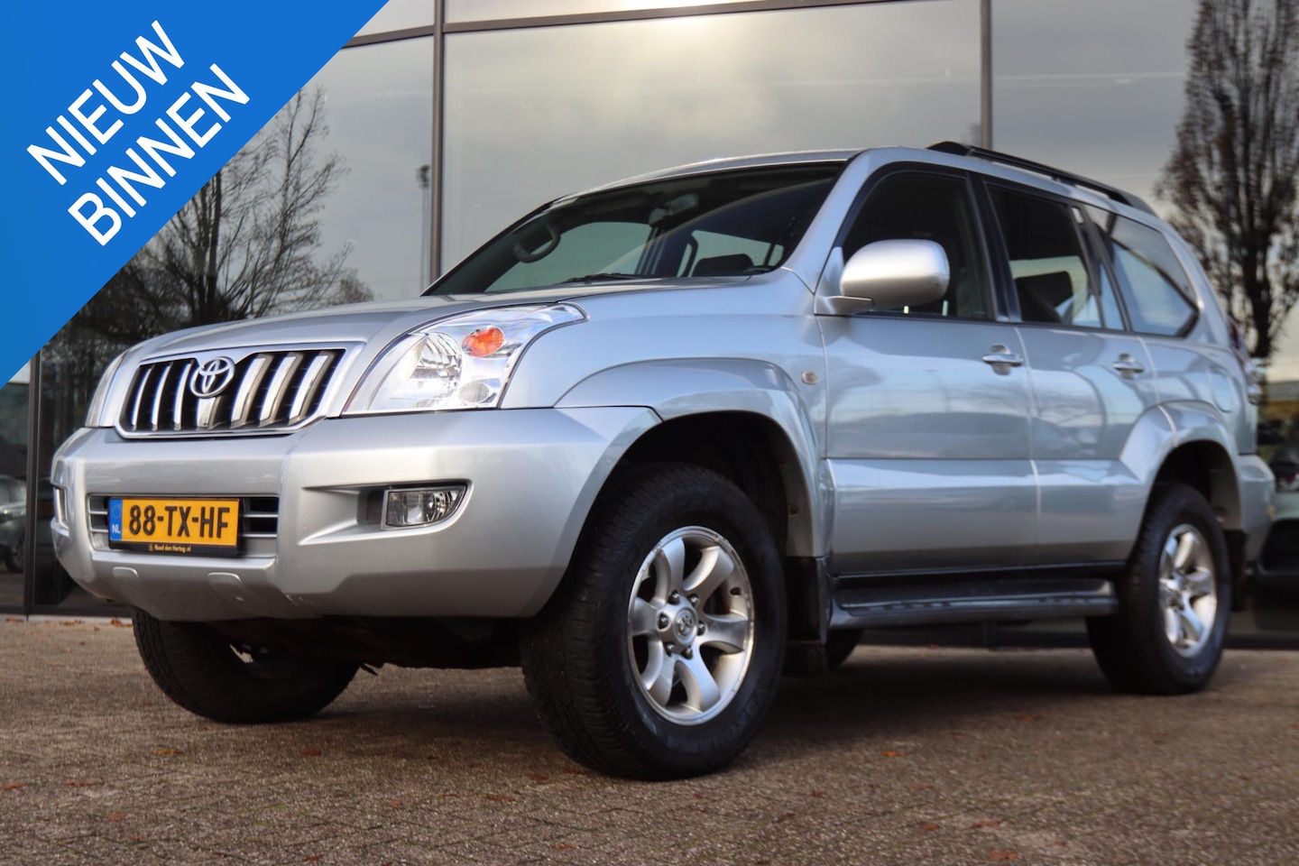 Toyota Land Cruiser 120 - 3.0 D-4D VX AUT. 4X4 *ORIG. NL / 1E EIG.* | 5-PERS | TREKHAAK 2800KG | CRUISE | CLIMATE - AutoWereld.nl