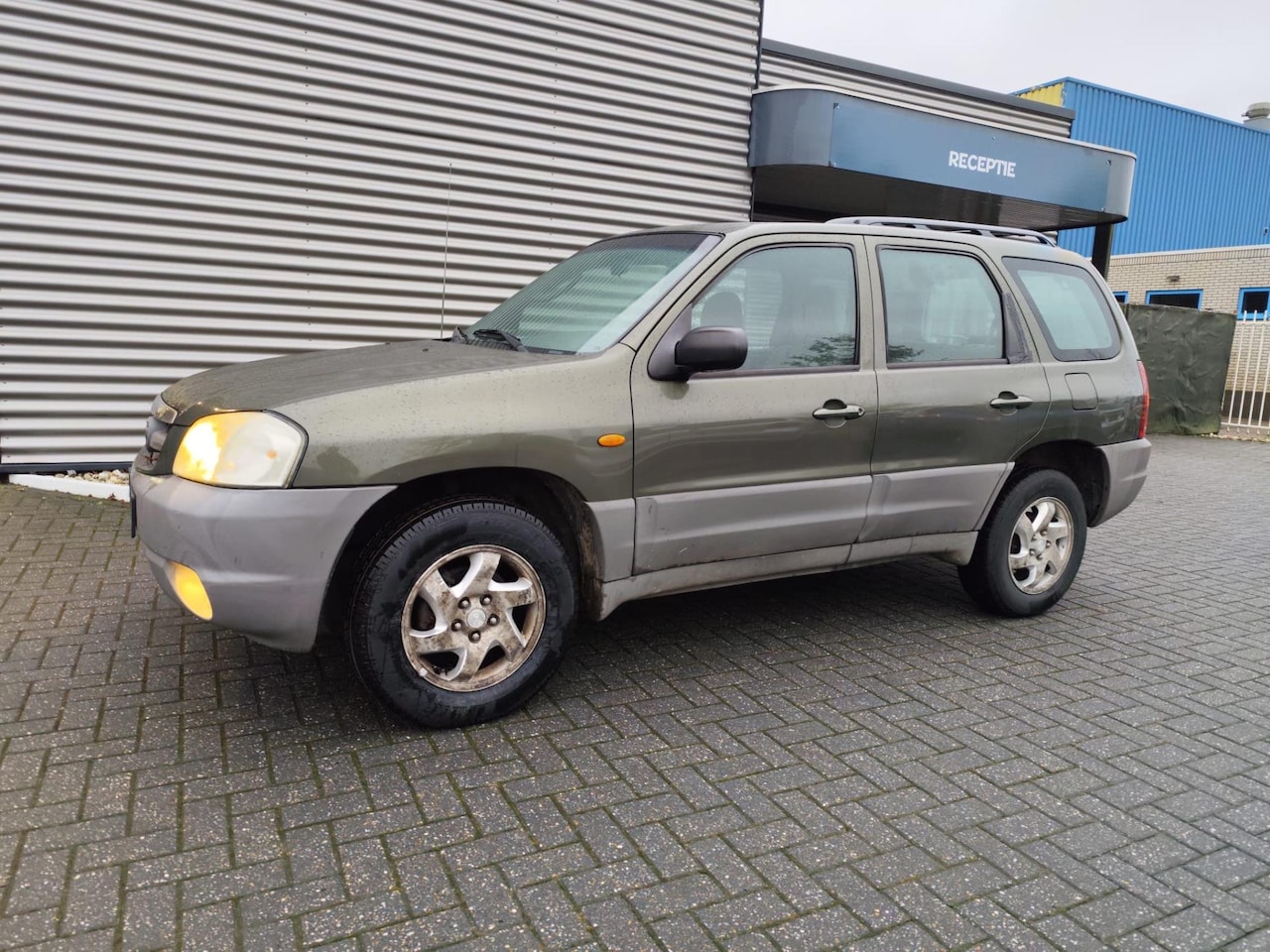 Mazda Tribute - 2.0 Exclusive 4WD 2.0 Exclusive 4WD - AutoWereld.nl
