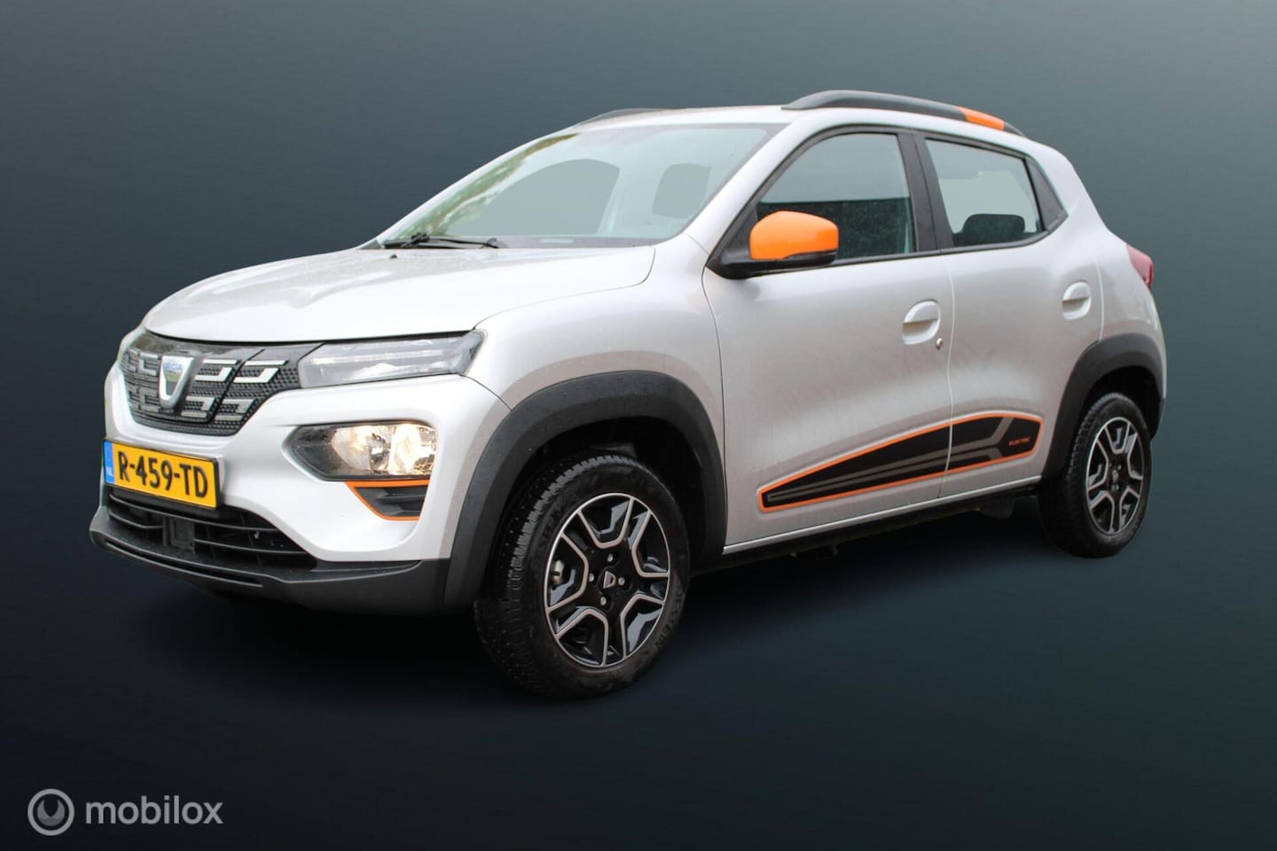 Dacia Spring - Business 27 kWh, Orange Pack, Pdc, Camera, Navi, Cruise, App connect. - AutoWereld.nl