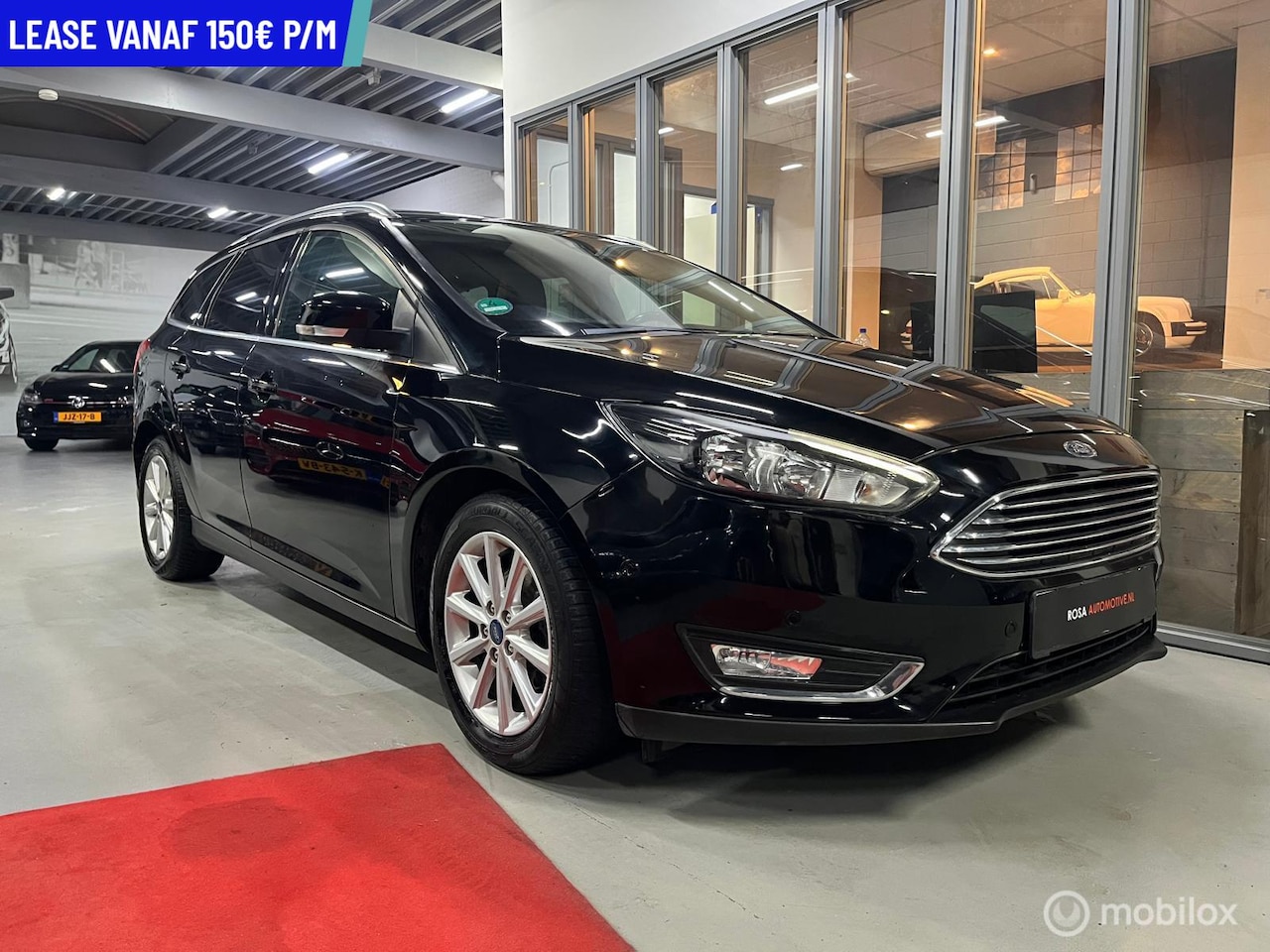 Ford Focus Wagon - 1.0 Titanium NAVI LEER ELEK STOEL.PDC CRUISE VEEL OPTIES STOELVERW. - AutoWereld.nl