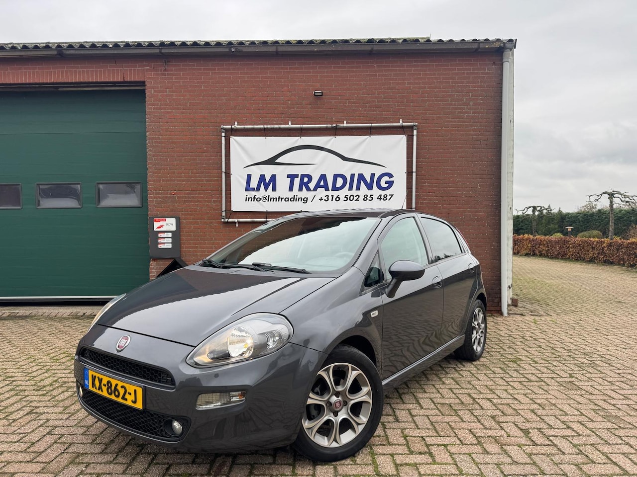 Fiat Punto Evo - 0.9 TwinAir Lounge 0.9 TwinAir Lounge NIEUWE APK, PDC TREKHAAK CLIMA LMV 2 SLEUTELS + BOEKJES! NAP! 2E EIGENA - AutoWereld.nl