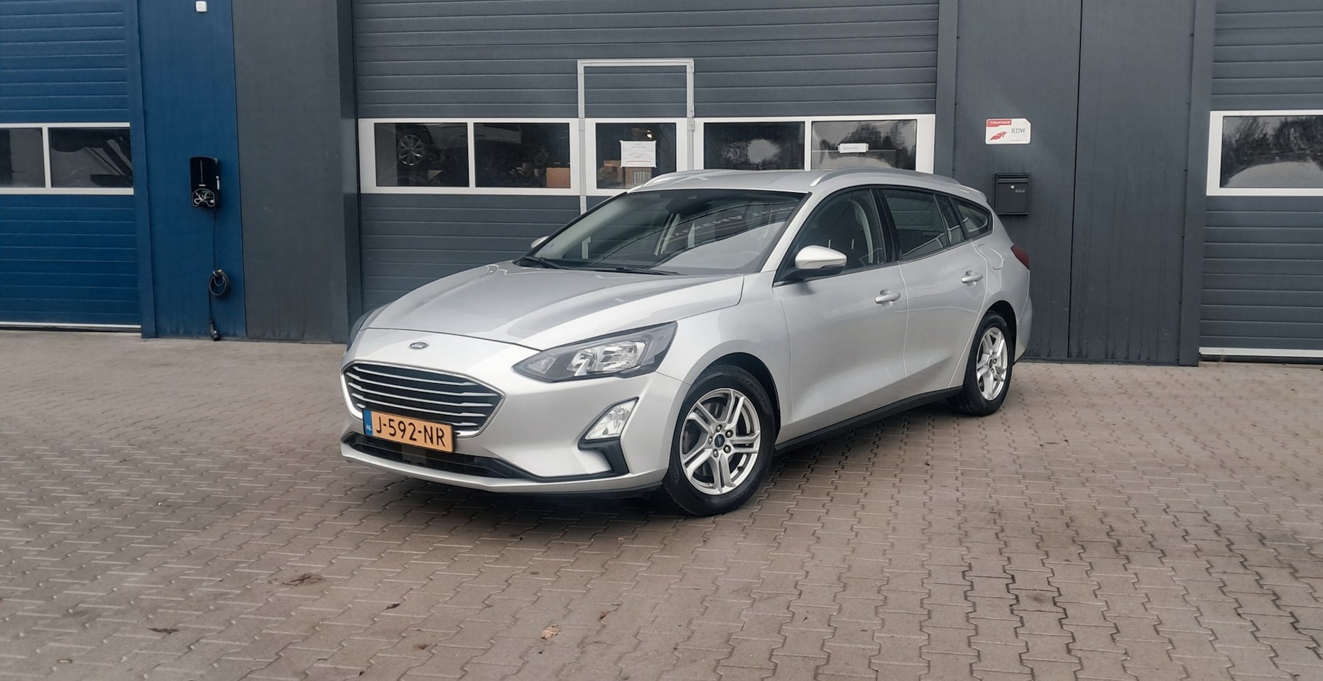 Ford Focus Wagon - 1.0 EcoBoost Hybrid Trend Business cruise-camera-pdc-carplay-navi - AutoWereld.nl