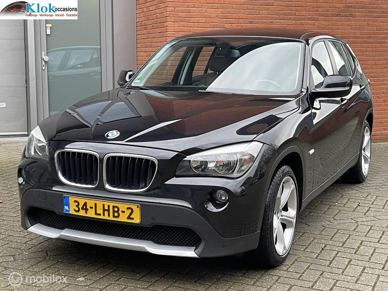BMW X1 - sDrive18i Executive Clima Cruise Navi Leer Trekhaak - AutoWereld.nl