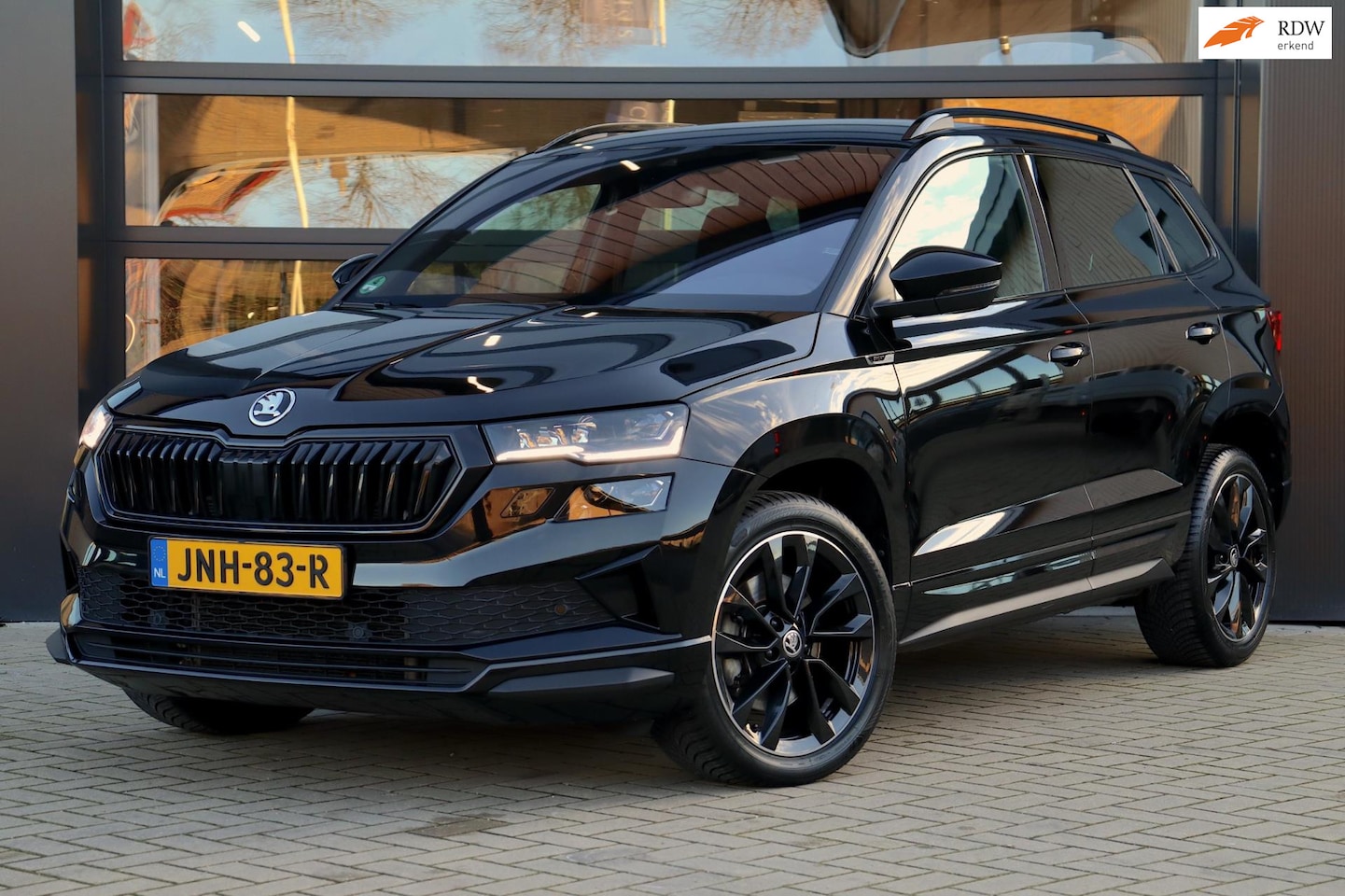 Skoda Karoq - 1.5 TSI ACT Sportline Business DSG | Navigatie | Matrix LED | 100% Onderhouden | 1e Eigena - AutoWereld.nl