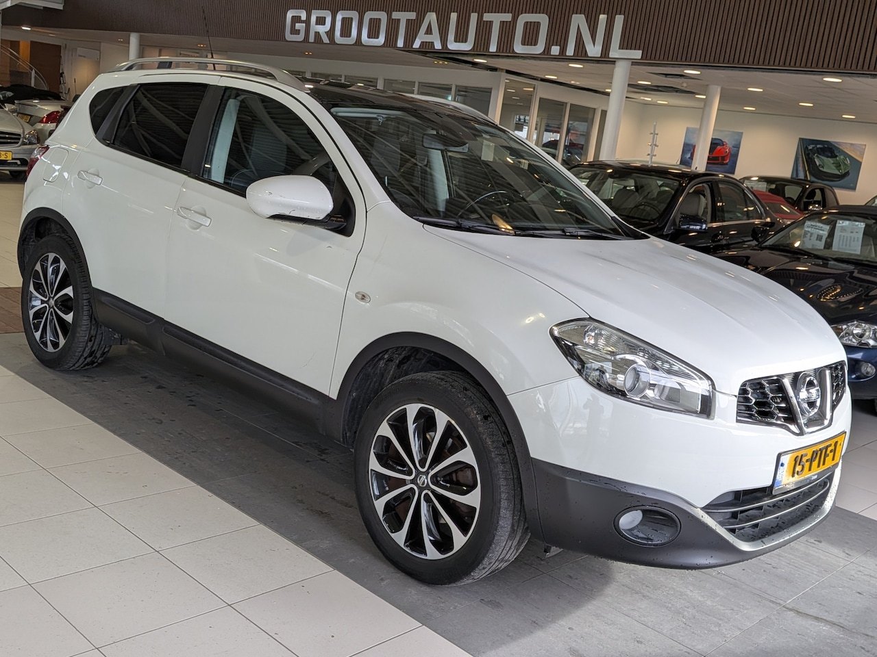 Nissan Qashqai - 2.0 Acenta Panoramadak, Airco, Trekhaak, Stuurbekrachtiging - AutoWereld.nl