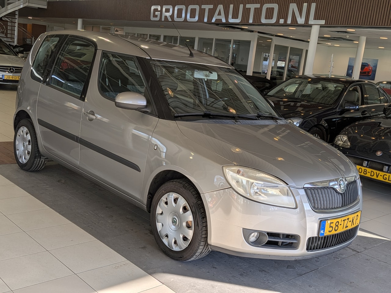 Skoda Roomster - 1.4-16V Style Airco, Trekhaak, Isofix, Stuurbekrachtiging - AutoWereld.nl