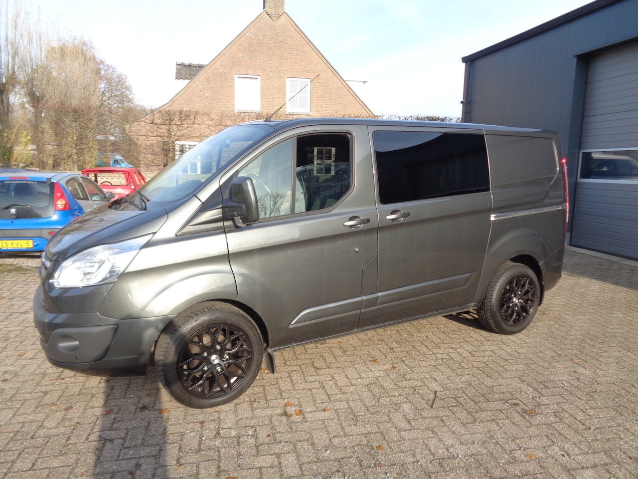 Ford Transit Custom - 270 2.0 TDCI L1H1 Limited DC Dubbel cabine, navigatie, trekhaak, 18 inch LMV, camera, 170 - AutoWereld.nl
