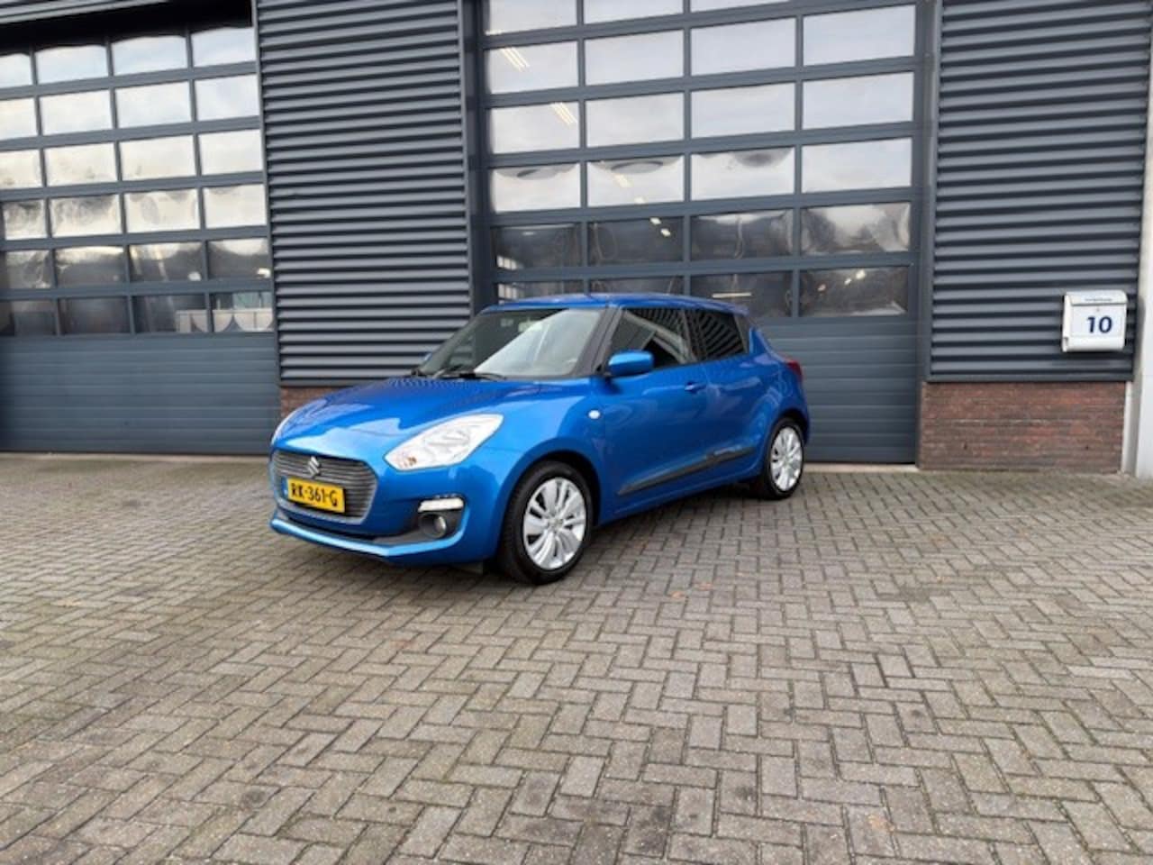 Suzuki Swift - 1.2 Select Airco Camera Navi Stoelverwarming - AutoWereld.nl