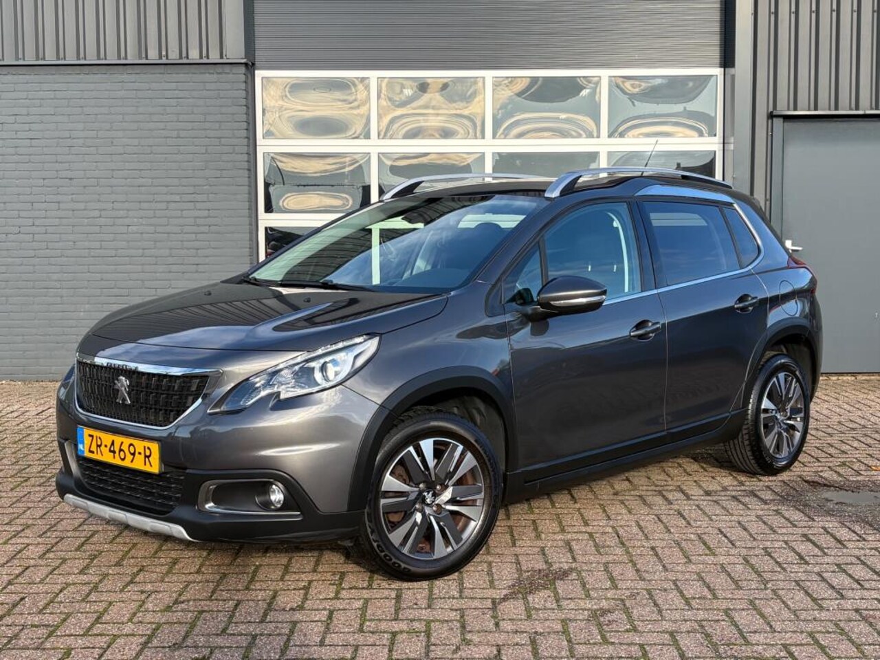 Peugeot 2008 - 1.2 PureTech Allure Automaat Camera Trekhaak Climate control - AutoWereld.nl