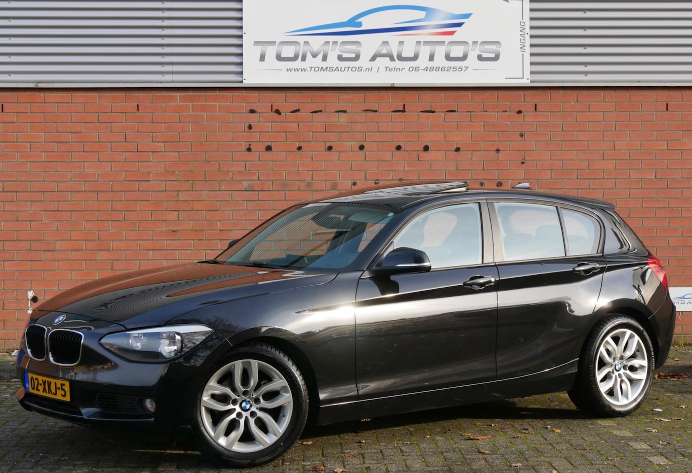 BMW 1-serie - 118i Business. pano. navi. ketting verv\ nieuwe turbo. - AutoWereld.nl