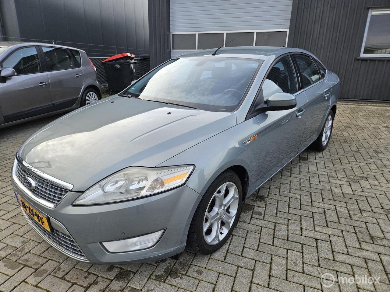 Ford Mondeo - 2.3-16V Titanium AIRCO/CRUISE/NAVI APK11/2026 - AutoWereld.nl