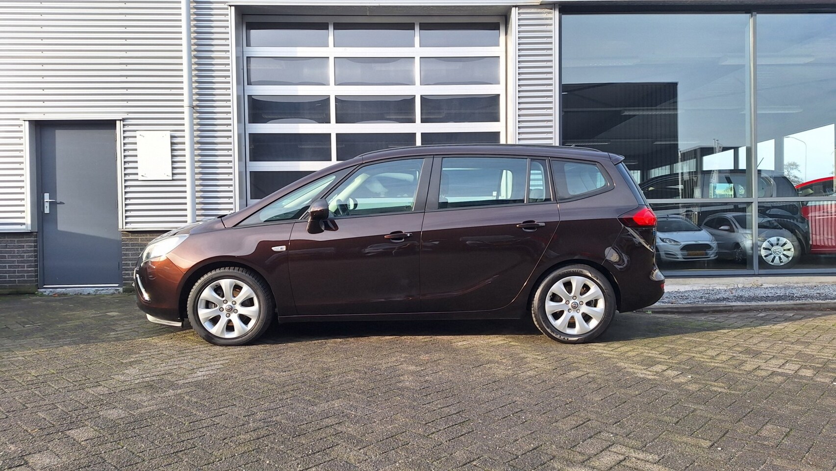 Opel Zafira Tourer - 1.4 Design Edition 1.4 Design Edition, 5 Deurs, Trekhaak, Navi, LM Velgen - AutoWereld.nl