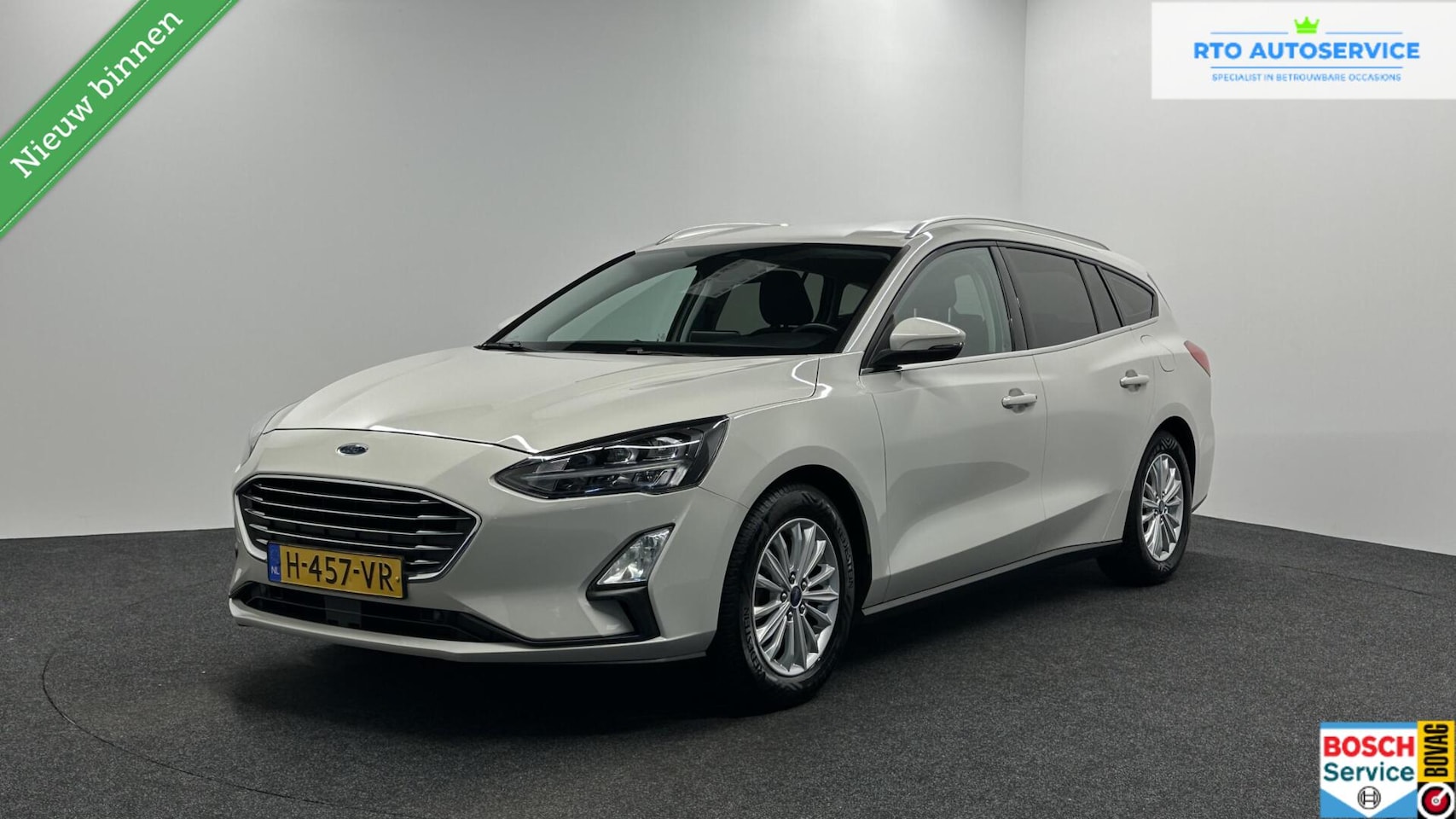 Ford Focus Wagon - 1.0 EcoBoost Titanium Business CRUISE LM CARPLAY TREKHAAK. - AutoWereld.nl